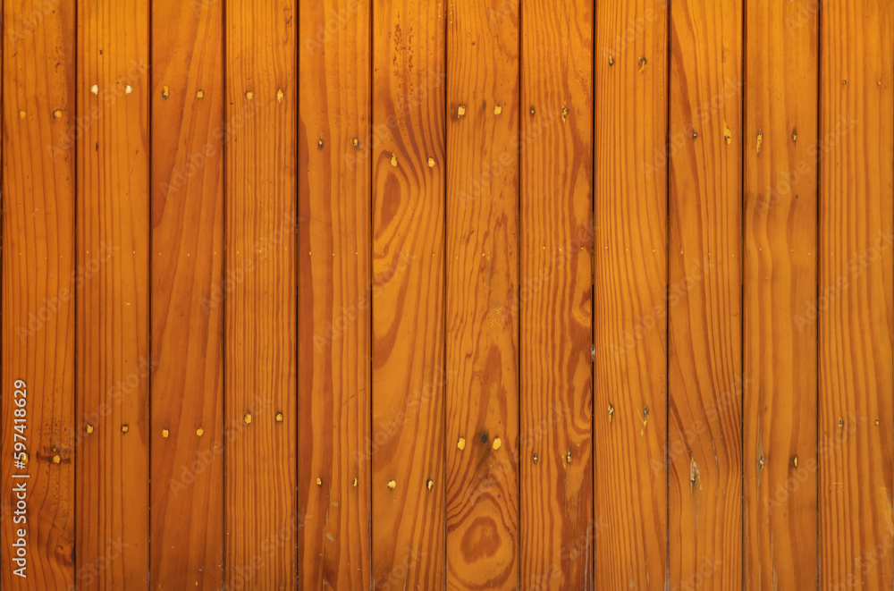 Fototapeta premium Natural wood slats wall or lath line arrange. Flooring pattern surface texture. Close-up of interior architecture material for design decoration background.