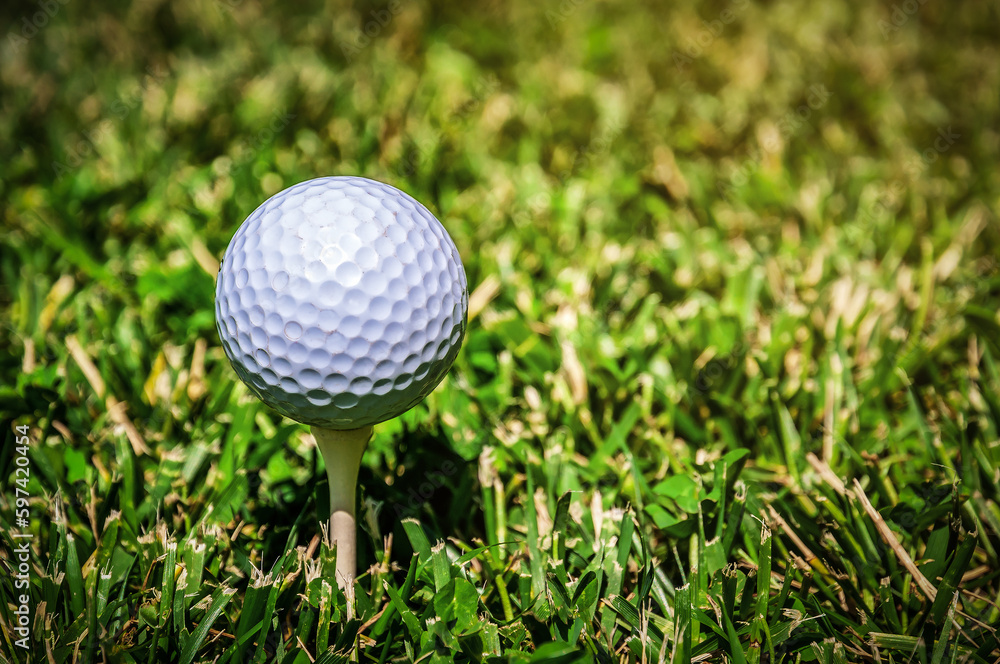 Golf ball on tee ready to play Golf ball on tee ready to play
