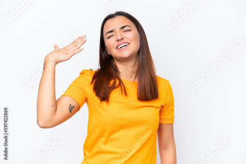 Young caucasian woman isolated on white background with tired and sick expression © luismolinero