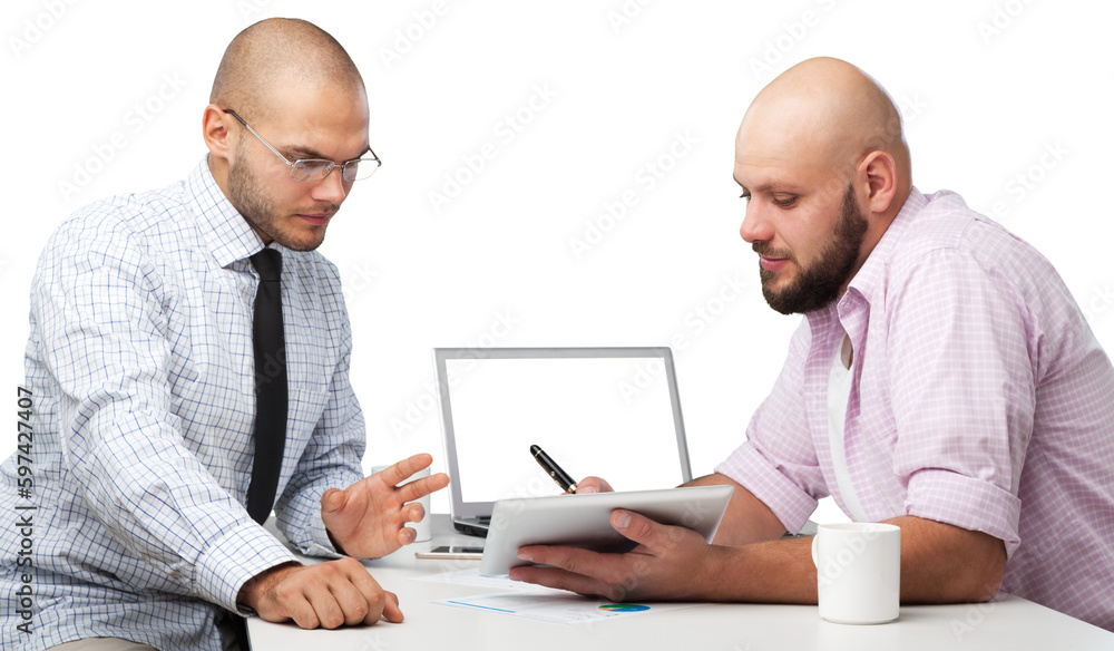 Fototapeta premium Team of serious businesspeople working on office desk