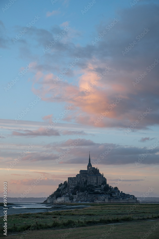 Le mont Saint-Michel in Normandy at sunset with low tide