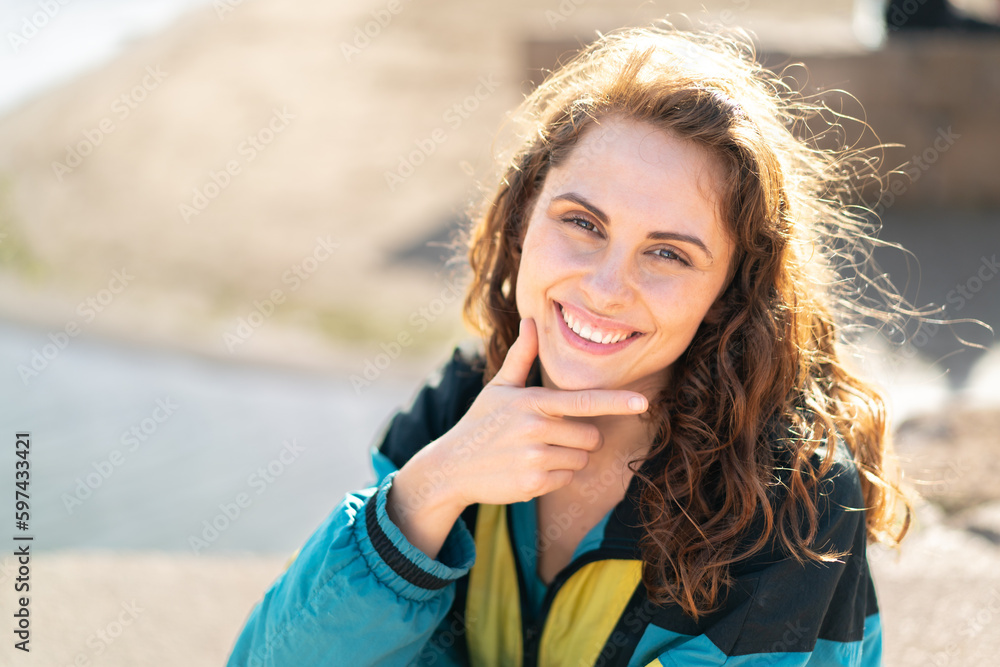 Young sport woman at outdoors smiling