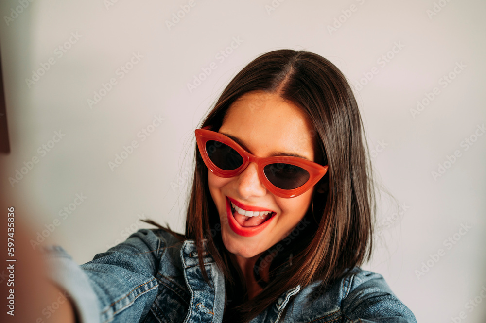 Close up of beautiful woman taking photo with smartphone, selfie. Close up of beautiful woman taking photo with smartphone, selfie.