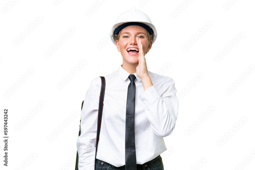 Young architect caucasian woman with helmet and holding blueprints over isolated background shouting with mouth wide open Young architect caucasian woman with helmet and holding blueprints over isolated background shouting with mouth wide open