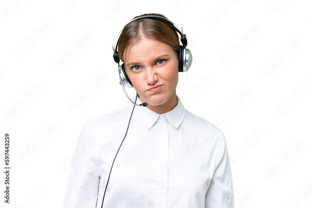 Telemarketer caucasian woman working with a headset over isolated background with sad expression Telemarketer caucasian woman working with a headset over isolated background with sad expression