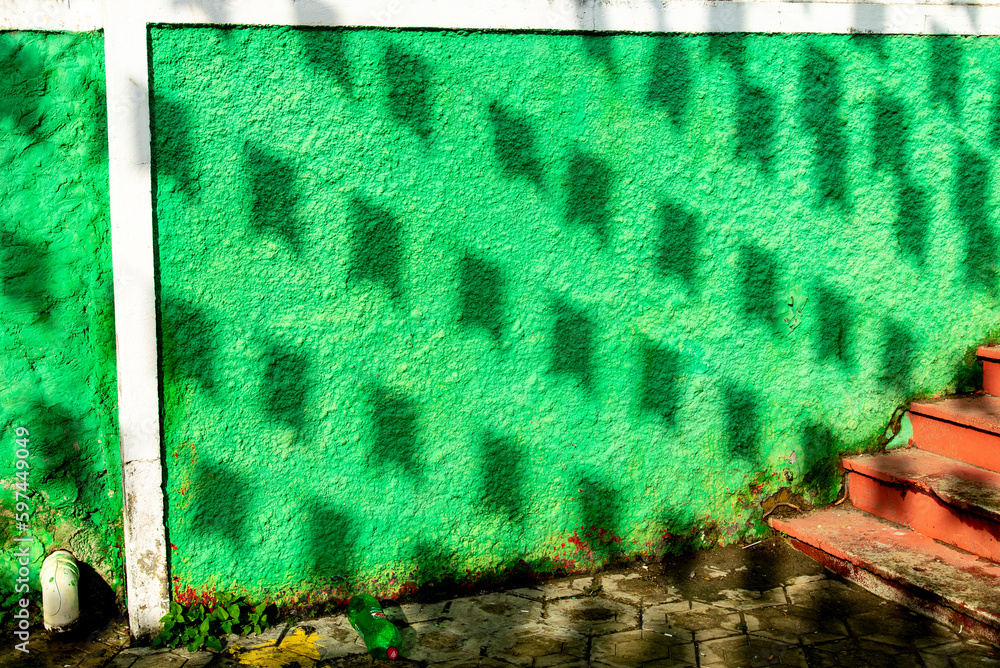 Shade on the houses from the decorative flags for the June festival of São João - obrazy, fototapety, plakaty 