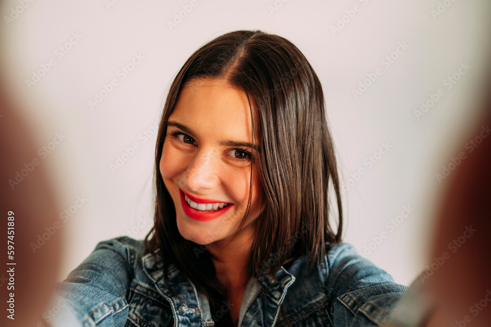 Close up of beautiful woman taking photo with smartphone, selfie. Close up of beautiful woman taking photo with smartphone, selfie.