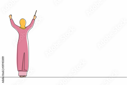 Single continuous line drawing back view Arab woman conductor performing on stage, female musician in tuxedo directing classic instrumental symphony orchestra. One line draw design vector illustration