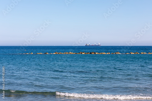 Sailing ship on the sea horizon