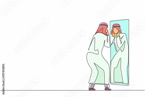 Single continuous line drawing Arab businessman holding his face on reflection mirror. Man applying lotion on stubble after-shaving or trimming, looking at mirror. One line draw graphic design vector
