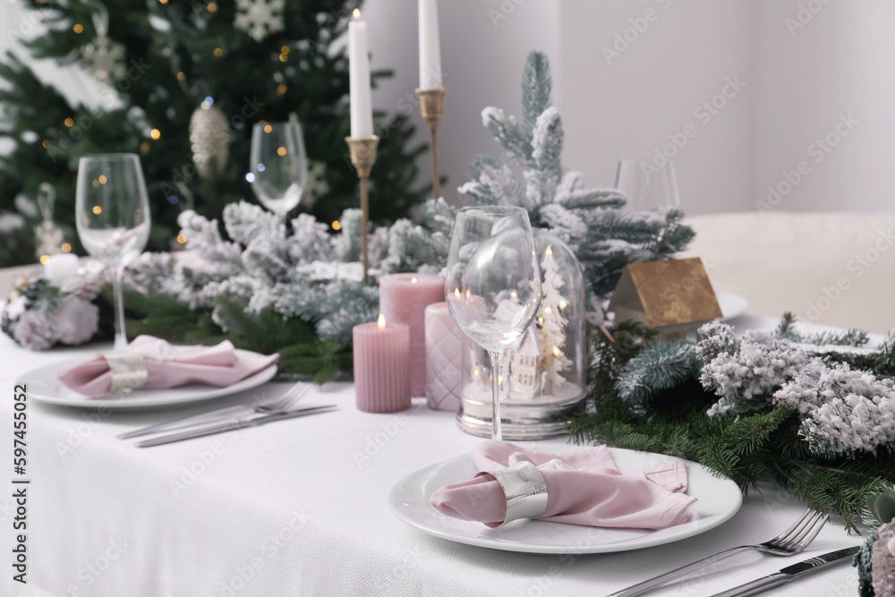 Fototapeta premium Beautiful table setting with Christmas decor indoors