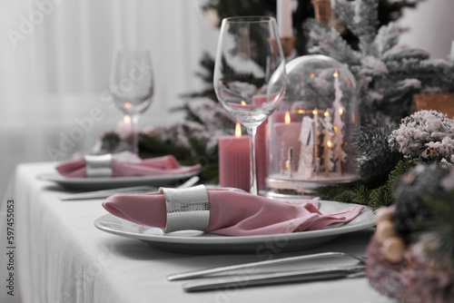 Beautiful festive table setting with Christmas decor indoors  space for text