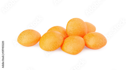 Tasty orange chewing gums isolated on white