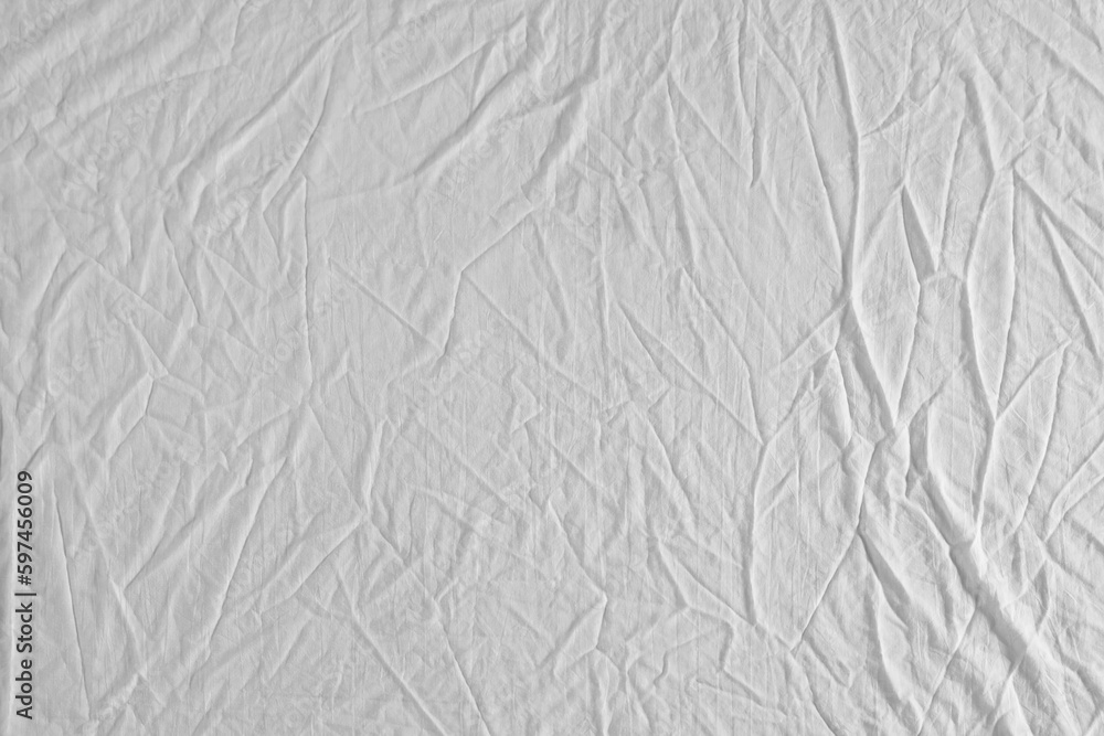 Crumpled white fabric as background, top view Crumpled white fabric as background, top view