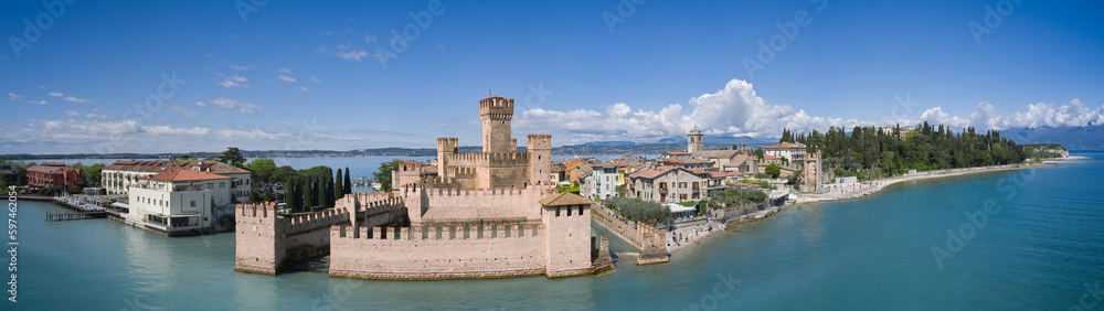 Magnificent panorama of Scaliger Castle on Lake Garda Italy. Sirmione best place on lake garda aerial view.