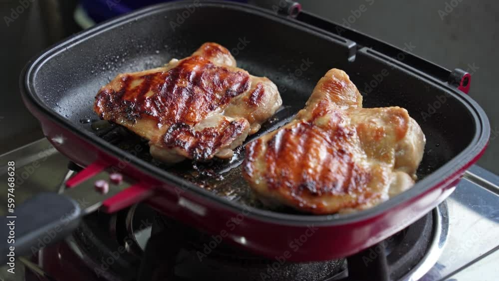 Homemade fried chicken chops in the grill pan. Homemade fried chicken chops in the grill pan.