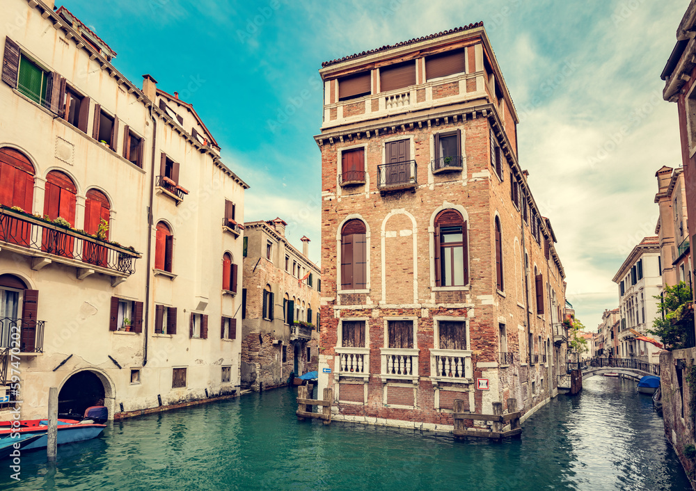 Floating house on canal in Venice, Italy