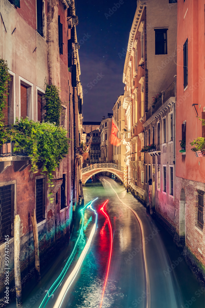 Venice, Italy at night with romantic canal and bridge