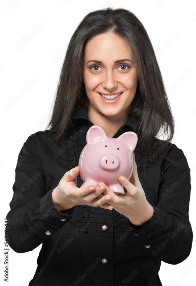 Young woman holding a piggy bank Young woman holding a piggy bank