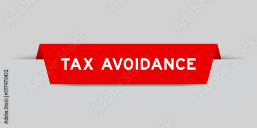 Red color inserted label with word tax avoidance on gray background