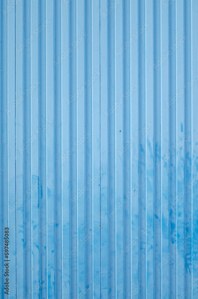 Detail of the texture of a painted blue metallic doorway Detail of the texture of a painted blue metallic doorway