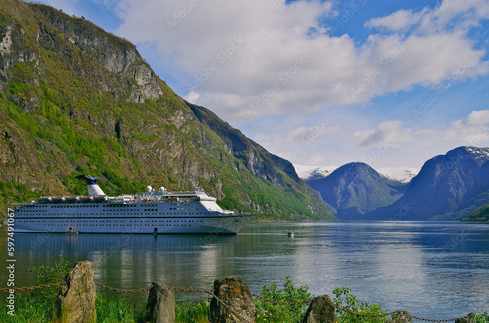 Modern cruiseship or cruise ship liner Star Magellan in Norway in Flam with beautiful landscape in Fjord	