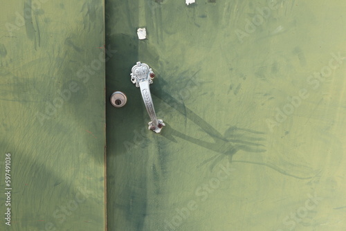 green door with door lock and doorknob design for security concept