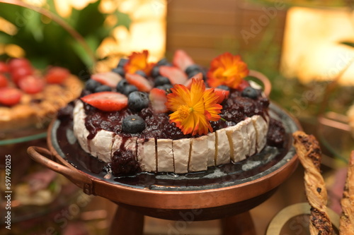 brie cheese with red fruit jam