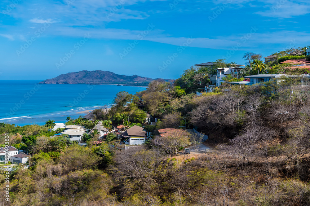 A view over the resort of Tamarindo towards the Tamarindo river in Costa Rica in the dry season