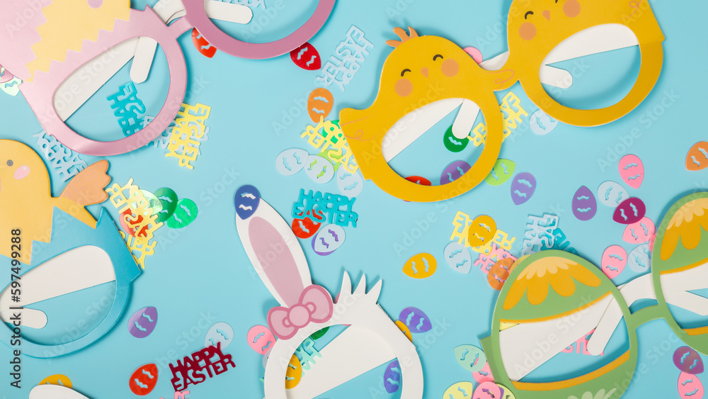 Happy Easter concept. Preparation for holiday. Easter eggs on on blue background. Simple minimalist flat lay top view Happy Easter concept. Preparation for holiday. Easter eggs on on blue background. Simple minimalist flat lay top view