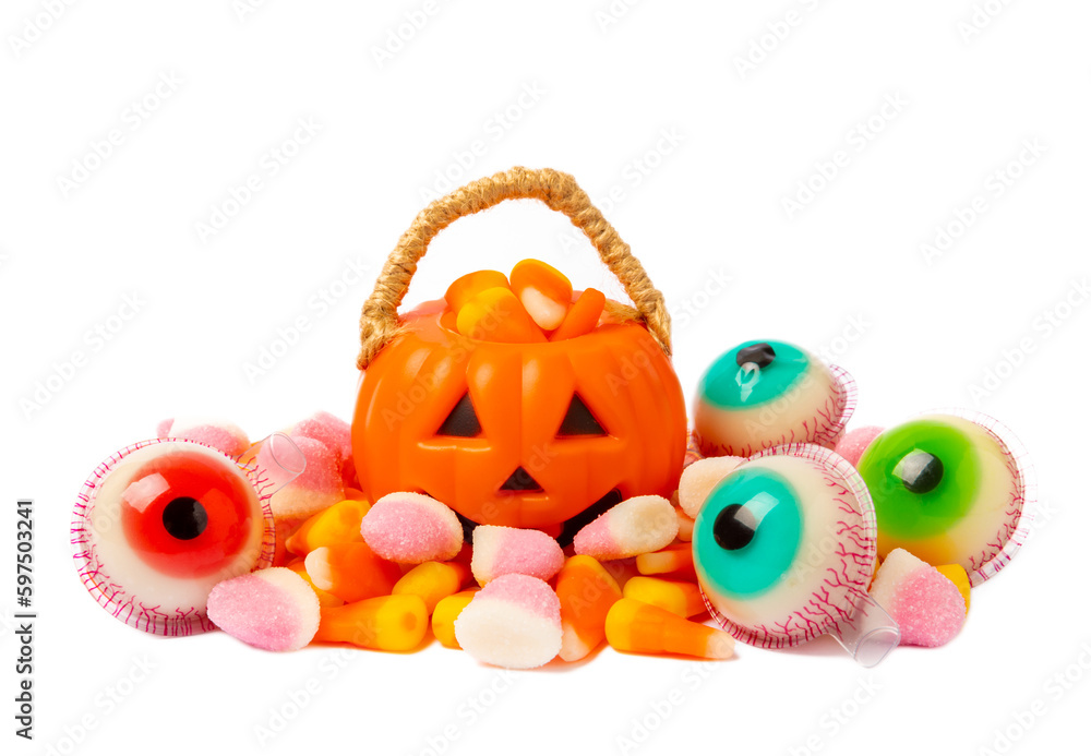 Halloween corn, jelly eyes, sugar skull and pumpkin candy isolated on white background. Classic sweet treats for Halloween. Halloween holiday concept with corn and jack o lantern. Halloween corn, jelly eyes, sugar skull and pumpkin candy isolated on white background. Classic sweet treats for Halloween. Halloween holiday concept with corn and jack o lantern.