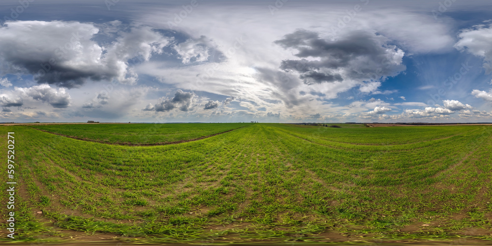 360 hdri panorama on green grass farming field with clouds on overcast sky before sunset in equirectangular spherical seamless projection, use as sky replacement in drone panoramas, game development