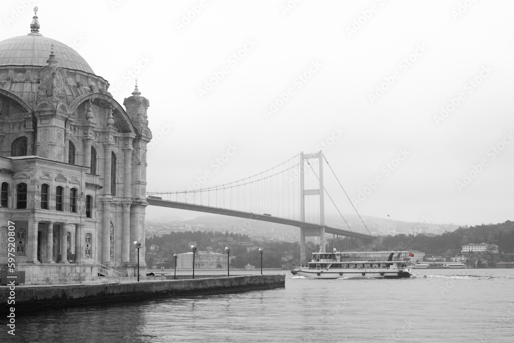 Bosporus with an iconic mosque, View of İstanbul black and white. Represent Turkish architectur and culture.