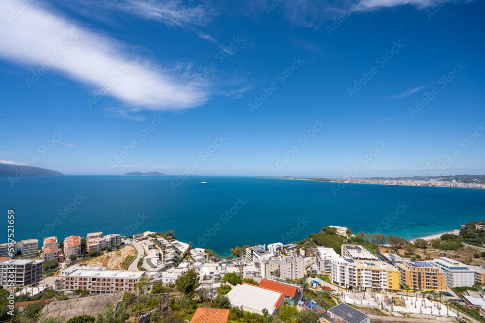 Attractive spring cityscape of Vlore city from Kanines fortress. Captivating morning sescape of Adriatic sea. Spectacular outdoor scene of Albania, Europe. Traveling concept background.