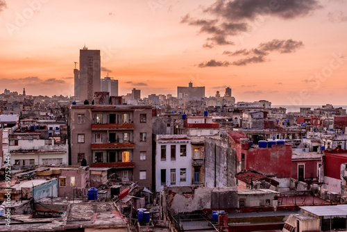 View over the rooftops of Havana in Cuba at sunset with the El National hotel