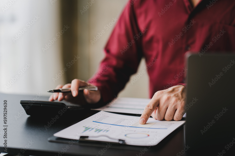 Portrait of man working on tablet computer in modern office make account analysis report Real estate investment information, financial and tax system concept Portrait of man working on tablet computer in modern office make account analysis report Real estate investment information, financial and tax system concept