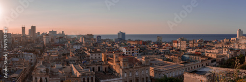 View over the rooftops of Havana in Cuba at sunset with the El National hotel © Nicolas VINCENT