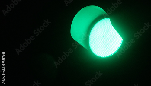 Close up green traffic light, Green light signal at night,. Represents to go on.