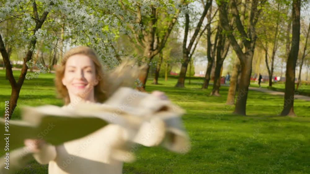 Rest, outdoor and joyful woman walking having fun smiling in park for health, peace, relaxing outside. Nature creative soft focus. Carefree female lady enjoying sunlight, fresh air for energy Rest, outdoor and joyful woman walking having fun smiling in park for health, peace, relaxing outside. Nature creative soft focus. Carefree female lady enjoying sunlight, fresh air for energy