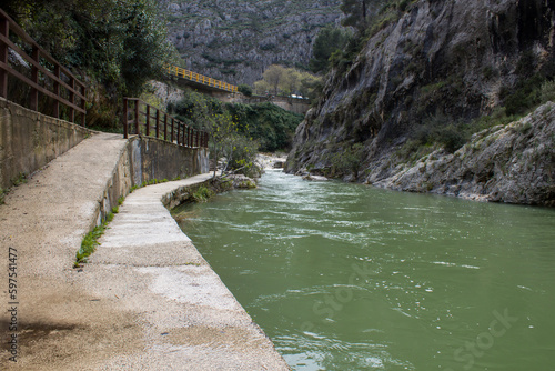 Cascadas y rocas despues de fuertes lluvias en el Pou Clar de Onteniente, España photo