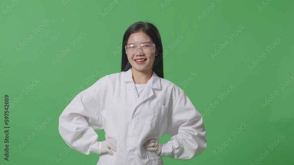 Asian Woman Scientist With Arms Akimbo Looking At Camera And Smiling While Standing On The Green Screen Background In The Laboratory
Asian Woman Scientist With Arms Akimbo Looking At Camera And Smiling While Standing On The Green Screen Background In The Laboratory
