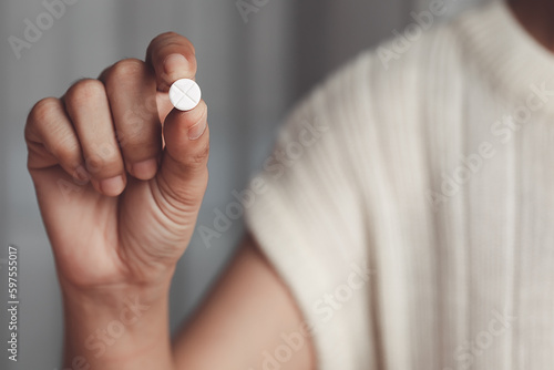 Asian woman's hand holding ...