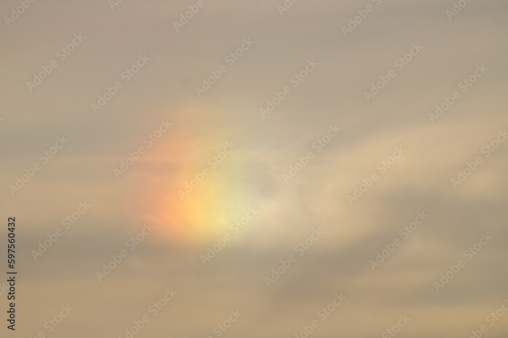 A mini rainbow in the sky as a result of the refraction of light over the Mediterranean Sea. 