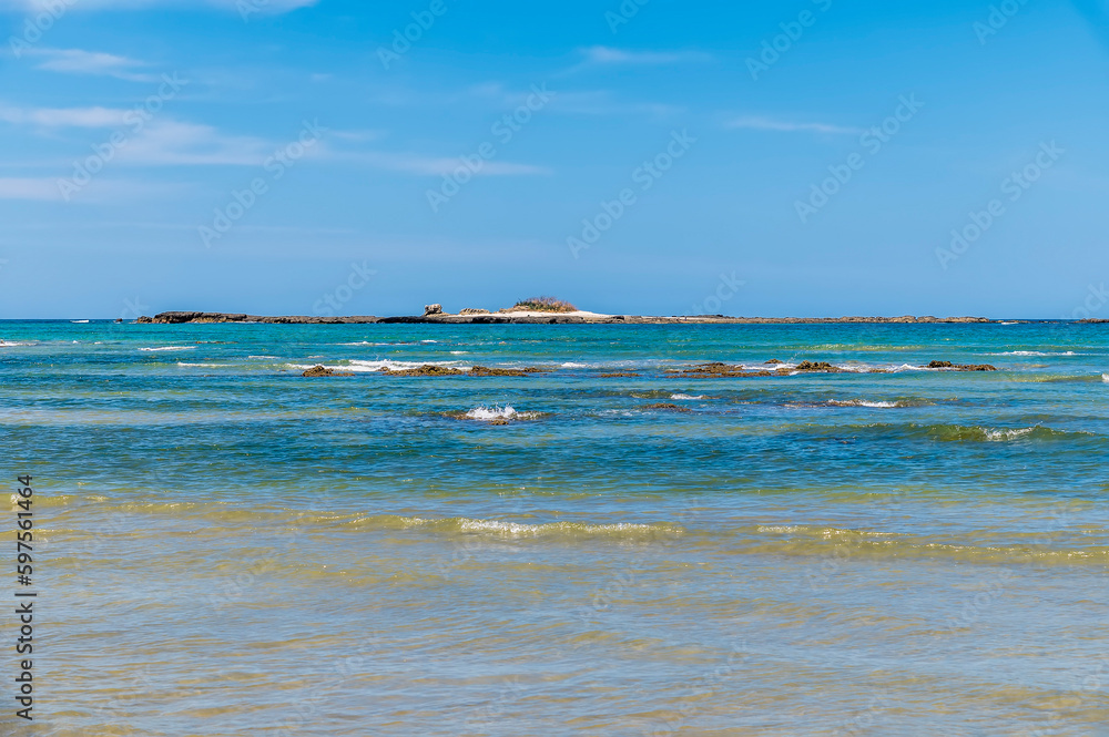 A view from the beach towards islets offshore at Tamarindo in Costa Rica in the dry season