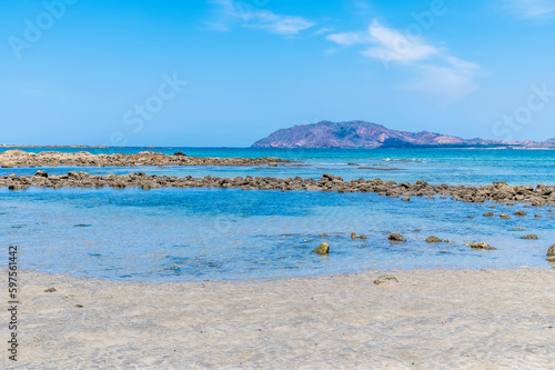 A view over rocky lagoons across the bay at Tamarindo in Costa Rica in the dry season photo