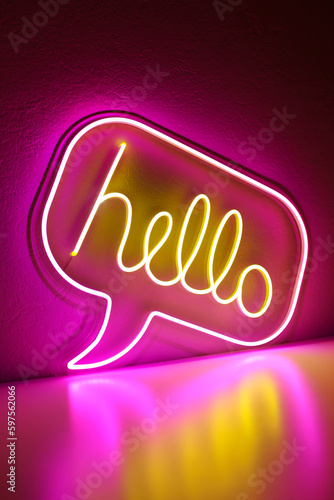 Pink and yellow neon sign hello. Trendy style. Hello. Neon sign. Custom neon. Home decor. photo