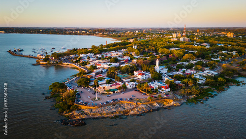 Aerial view Colonia del Sacramento old city lighthouse with glowing sunrise on the Uruguay 