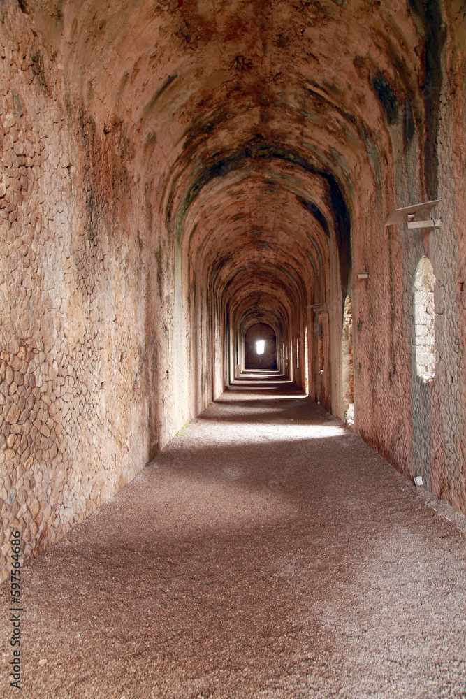 Perspective view of the tunnel of the Roman support structure of the ruins of the temple of Giove Anxur (Juniper), Terracina, Lazio, Italy