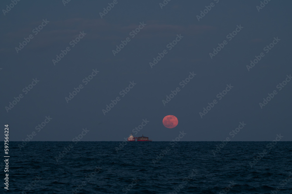Moon Rising Over Lake Michigan in Chicago Moon Rising Over Lake Michigan in Chicago