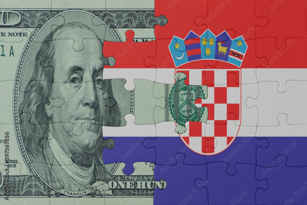 puzzle with the national flag of croatia and dollar money banknote. macro.concept.